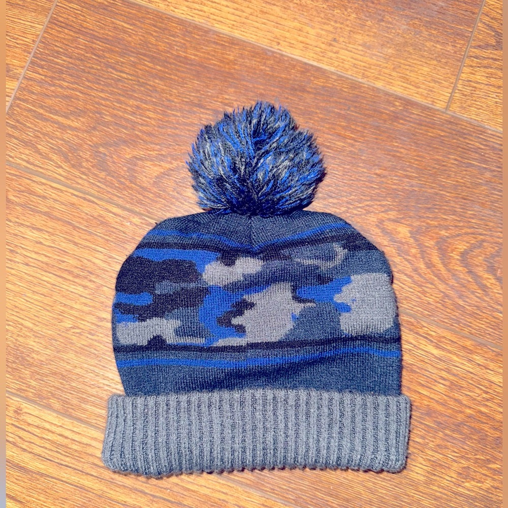 Youth size camo hat with pompom top